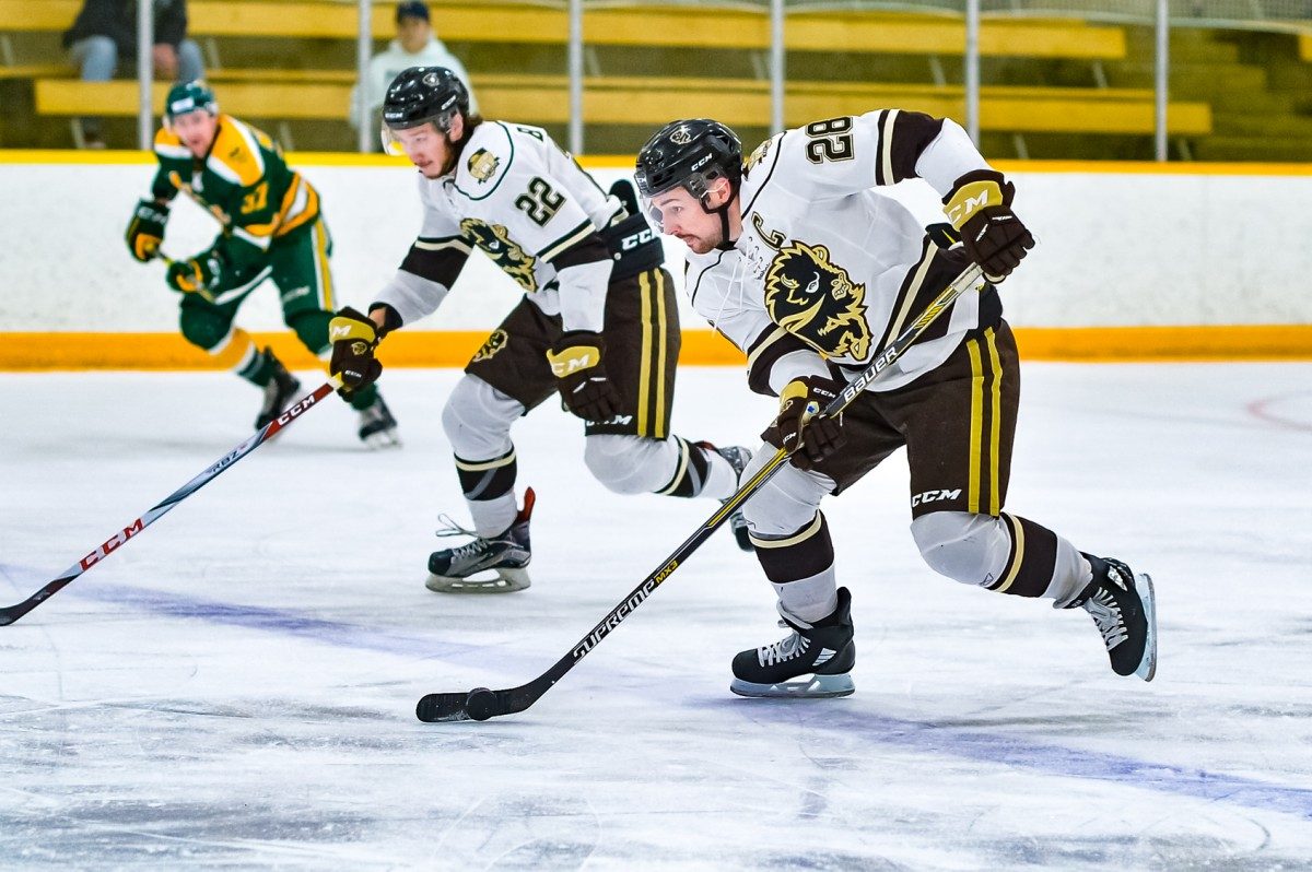 Bison Brett Stovin carries the puck up the ice // Photo: Jeff Miller