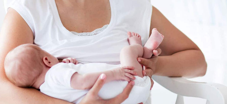 Mother breastfeeding her baby