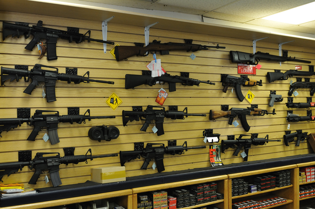 a wall of guns in a store