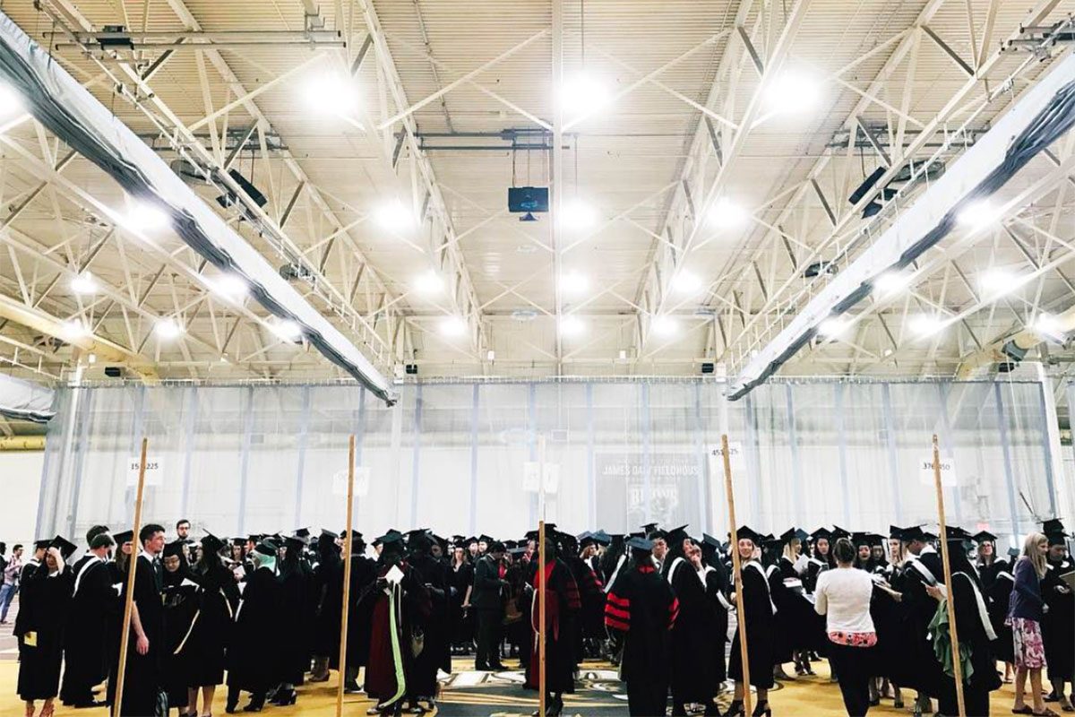 Grads line up backstage for Convocation in June 2018.