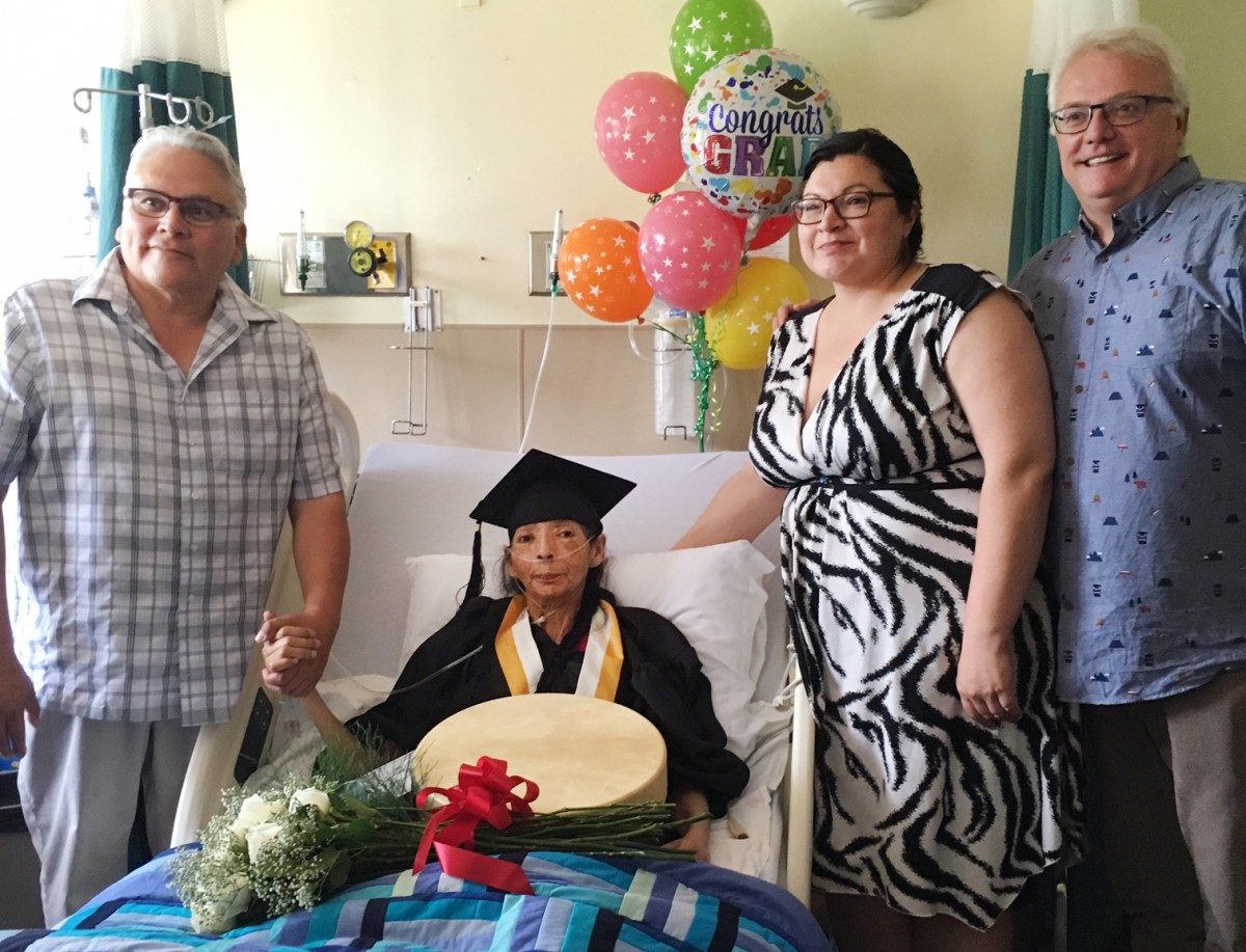 Edith Linklater celebrates graduation in a hospital bed