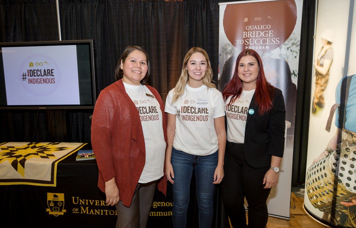 Marla Robson (left) works with student volunteers