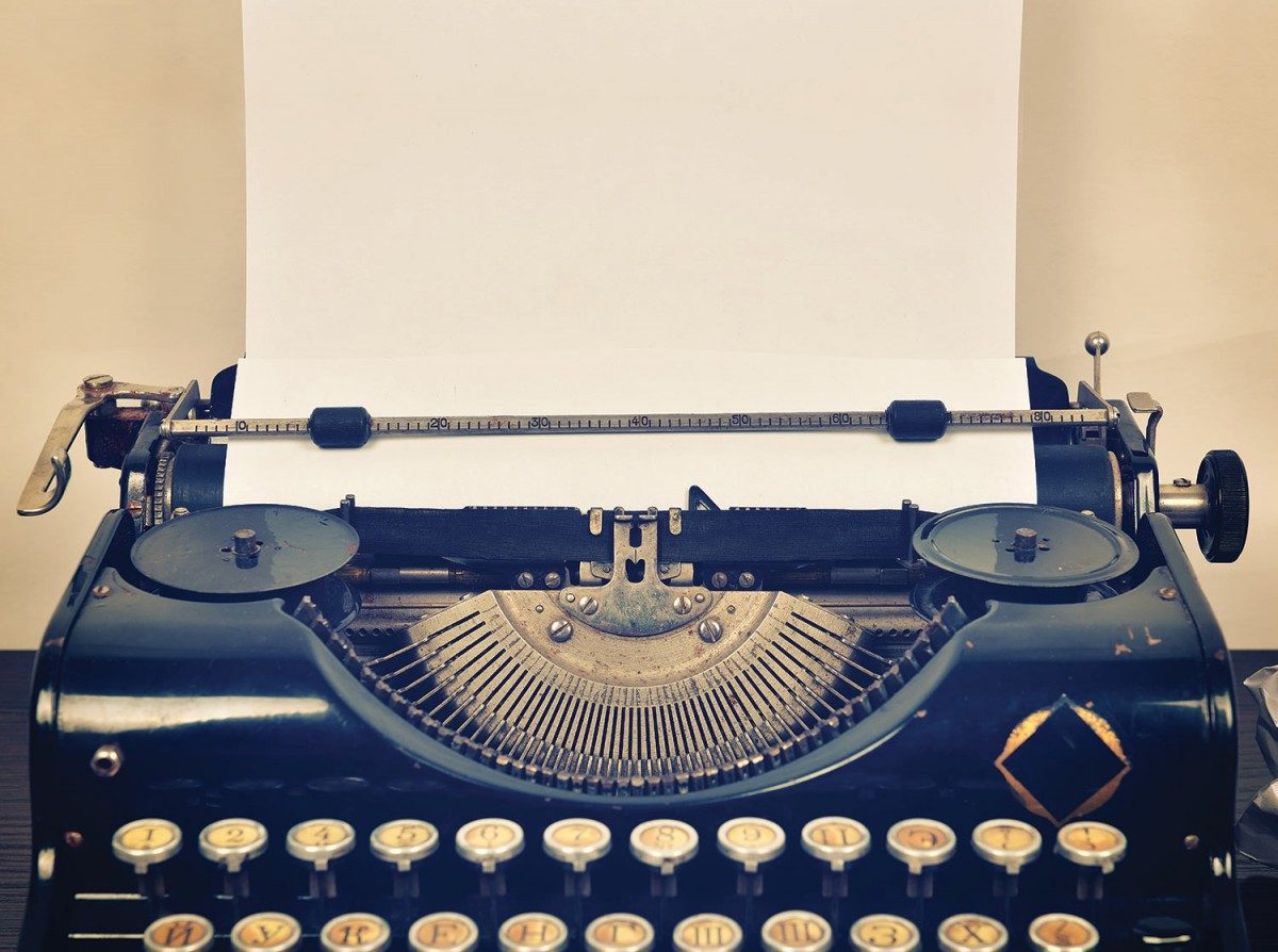 An old typewriter with loaded paper