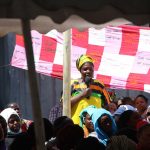 Peer leader speaks to the sex worker community at the annual Baraza (community meeting) in Nairobi, Kenya. // Image from Julie Lajoie