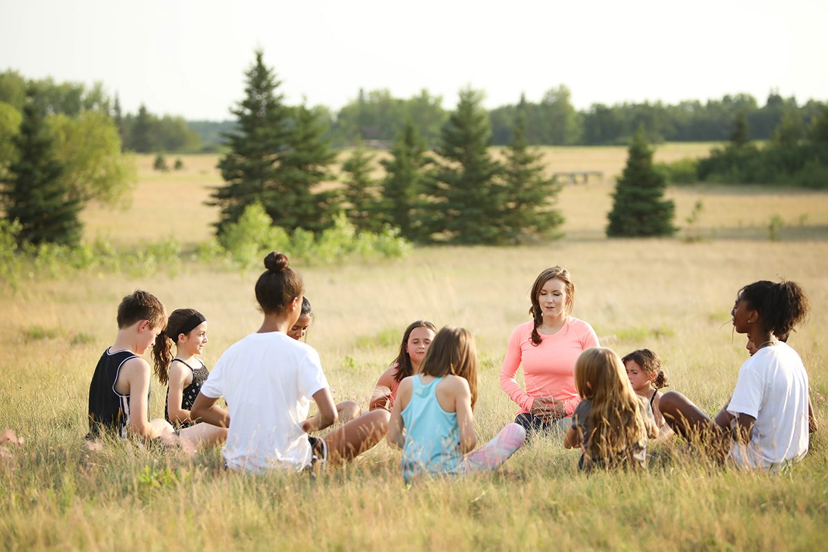 Suzi Friesen, director of programming for Project 11, leads a class in mindfulness meditation.