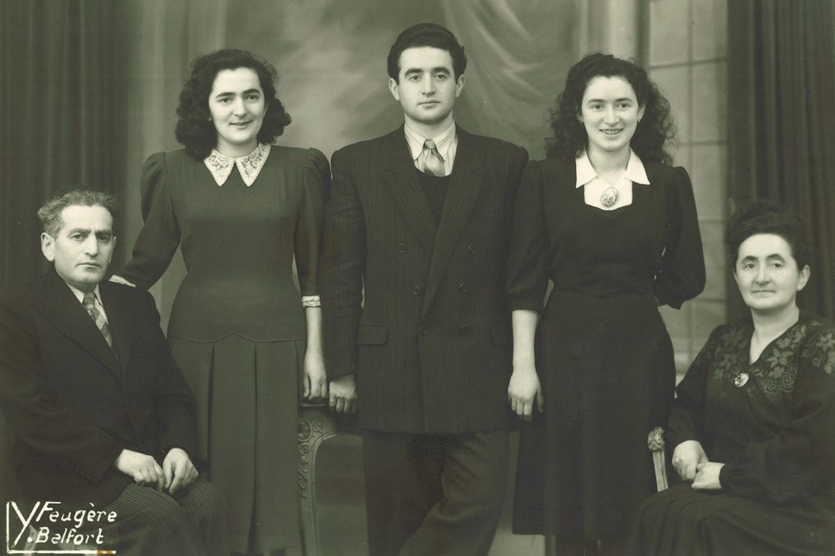 George Rubenfeld (centre) with his family in France, 1950. // Photo credit: Belle Jarniewski, Voices of Winnipeg Holocaust Survivors