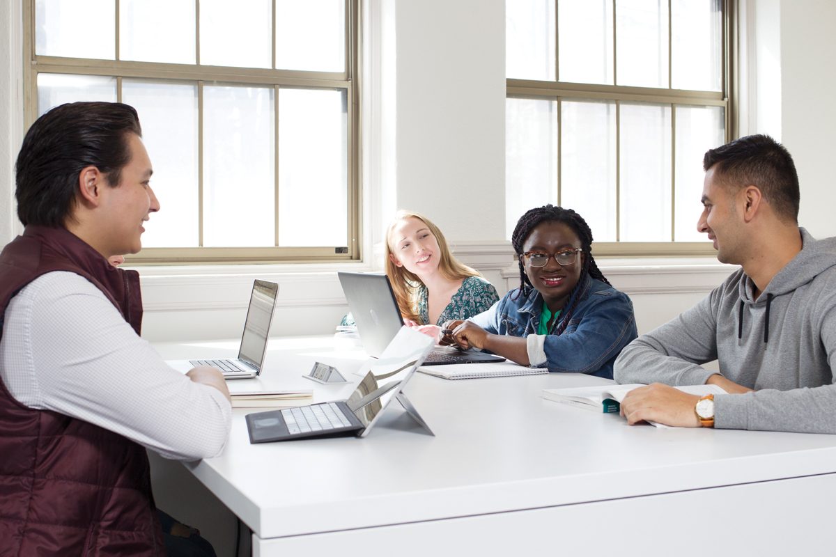 Students sitting around a table