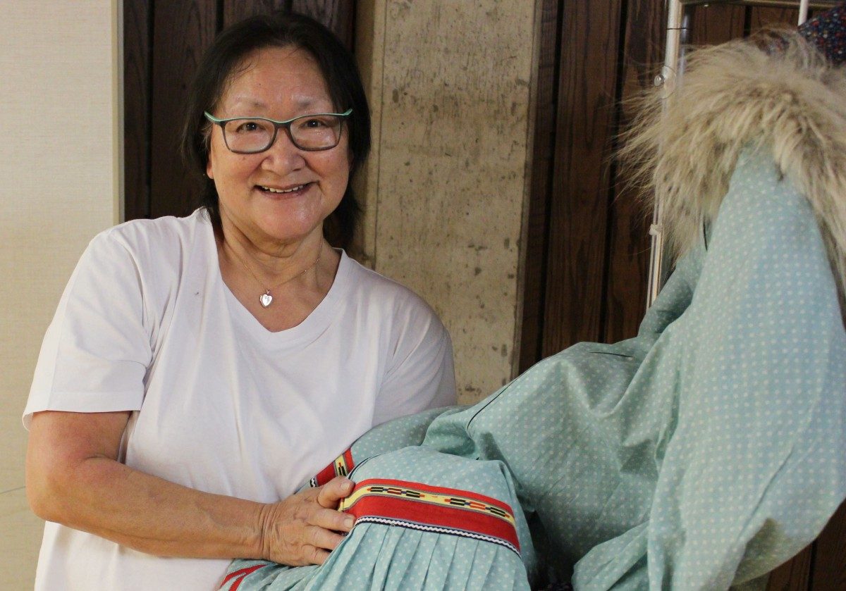 Martha Peet, with the coat her mother made for her.