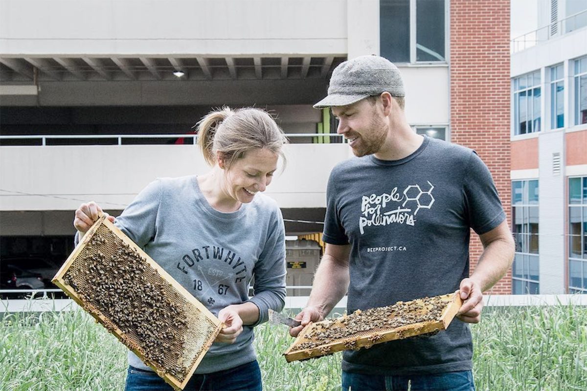 Lindsay Nikkel and Chris Kirouac are the founders and owners of BeeProject Apiaries. // Photo from Sara Sealey