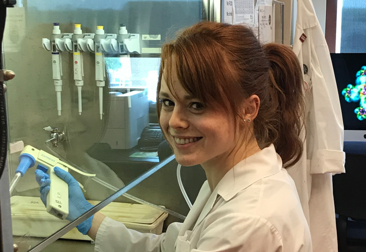 Kailee Rutherford works in a lab at CancerCare, helping to identify genes that play roles in cancer development