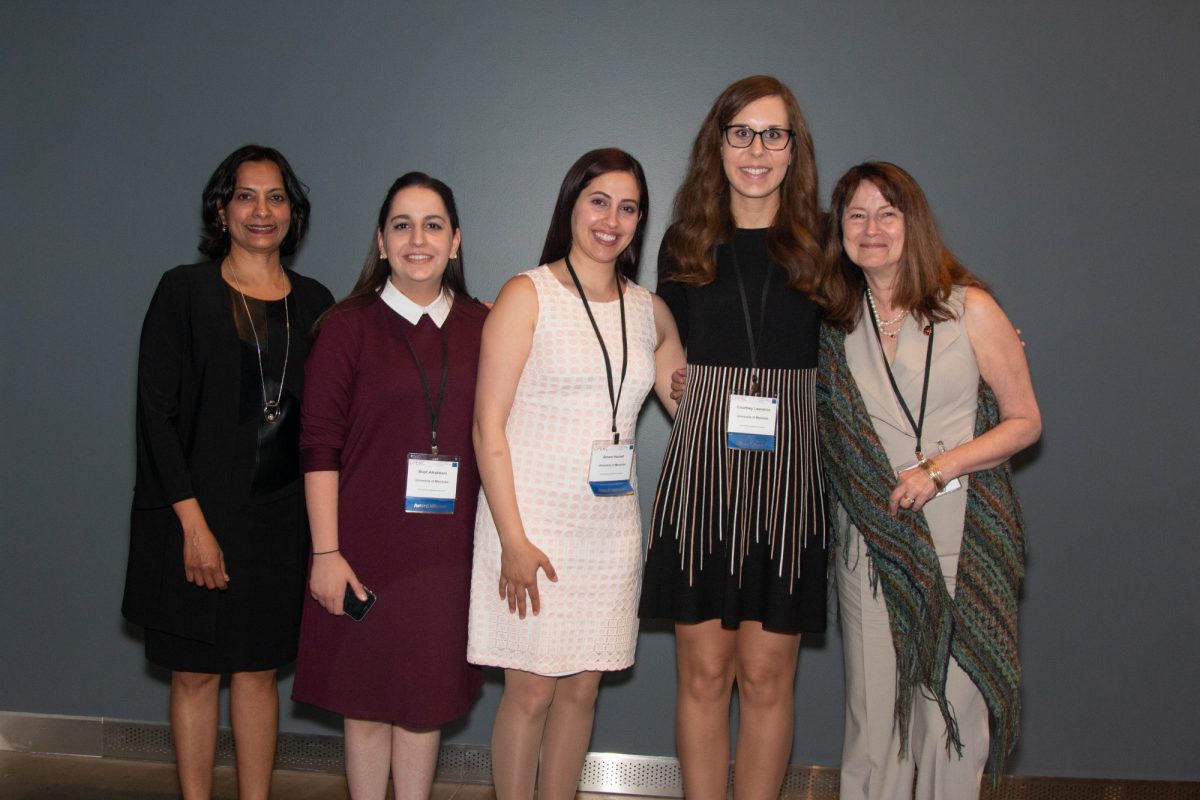 Dr. Lalitha Raman-Wilms, dean of the College of Pharmacy, award winners Wajd Alkabbani, Amani Hamad, and Courtney Lawrence, and Dr. Silvia Alessi-Severini