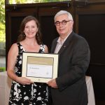Chantal Bassett receives award from President Barnard