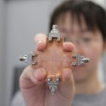 The nonreciprocal cavity magnonics device that can "cloak"