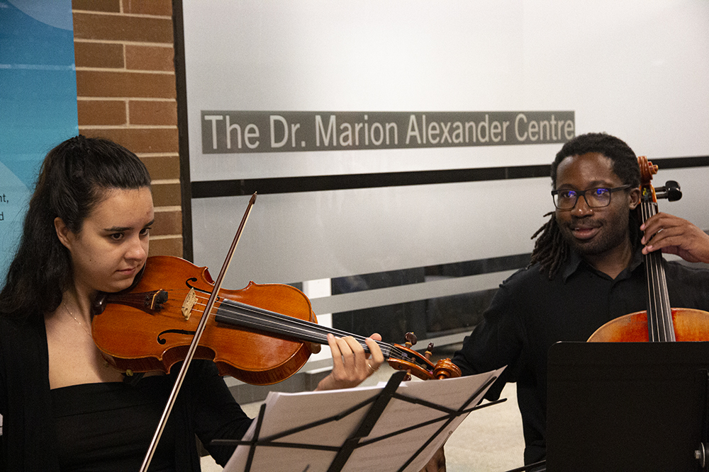 A string quartet plays music at the ceremony 