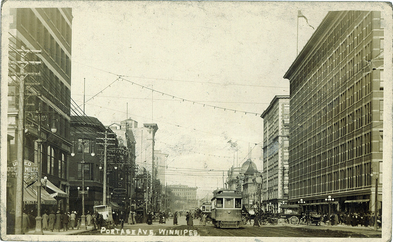 Winnipeg postcard, 1920s. Eaton's Store, Winnipeg, Manitoba, Canada. View on Portage Avenue looking east.