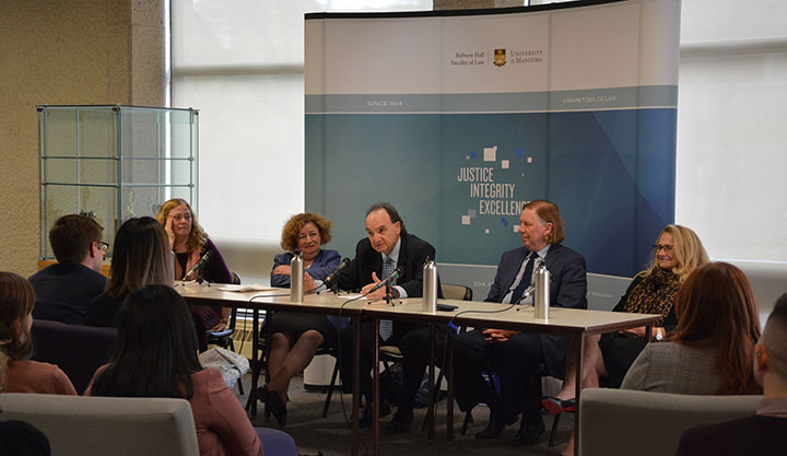 The Hon. Justice Moldaver answers a law student's question in the Common Room at Robson Hall. Left to right: Prof. Karen Busby, Director of the Centre for Human Rights Research; the Hon. Freda Steel, Manitoba Court of Appeal; the Hon. Michael J. Moldaver; the Hon. Malcolm Rowe; the Hon. Sheilah L. Martin