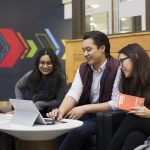 students on a laptop