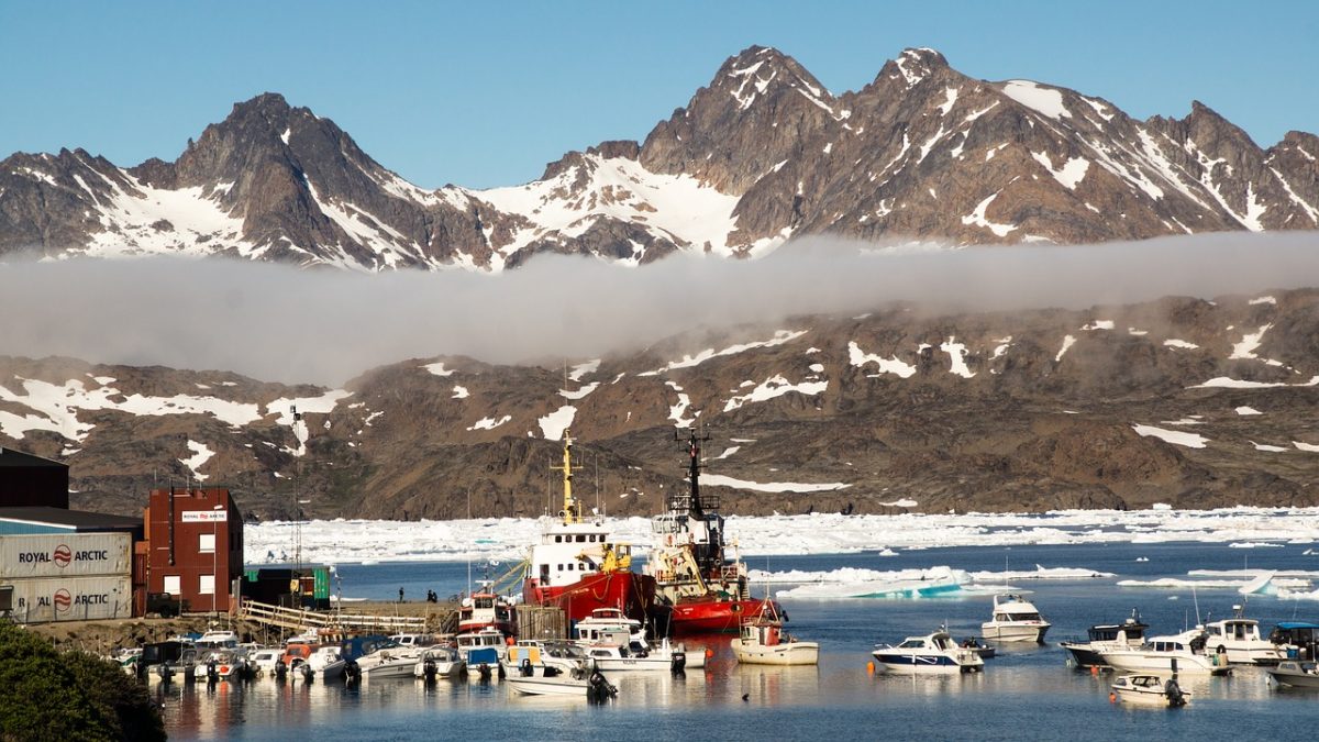 Ships and motor boats at an Arctic harbour