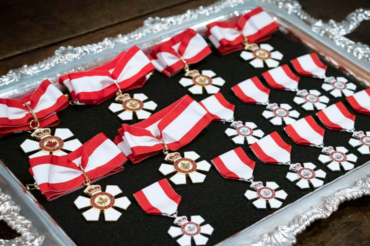 Order of Canada medals on a silver tray. // Photo credit Sgt Johanie Maheu, Rideau Hall.