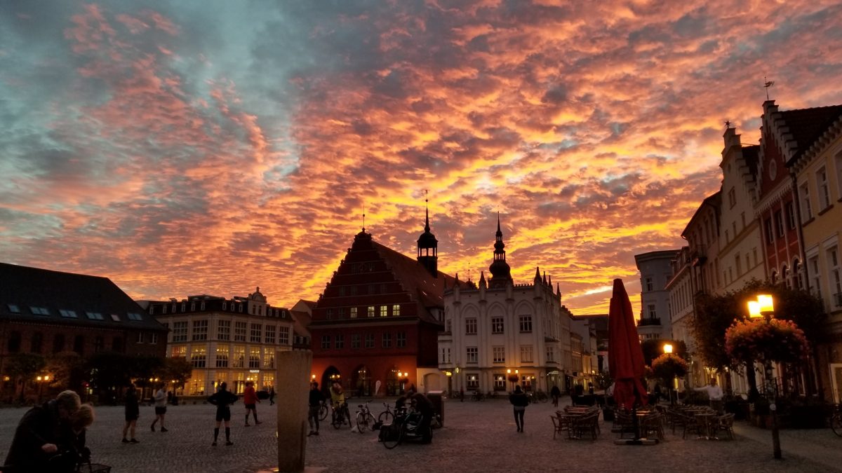 Sunset in Greifswald, Germany town square