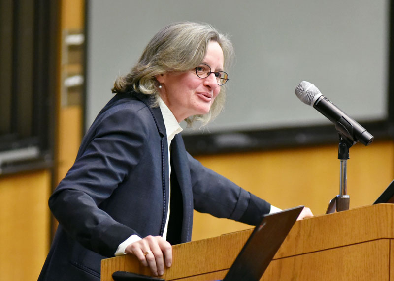 Dr. Laurie Shannon presents at a podium