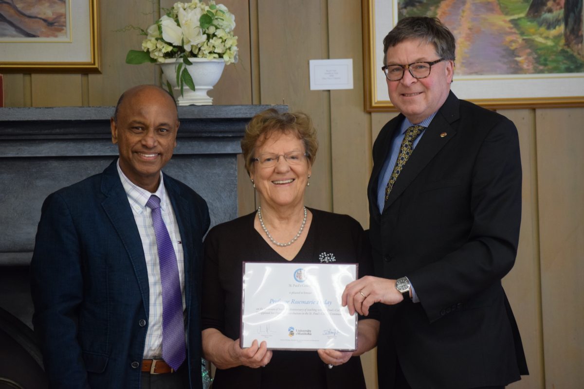 Professor Rosmarie Finlay accepting her certificate of appreciation.