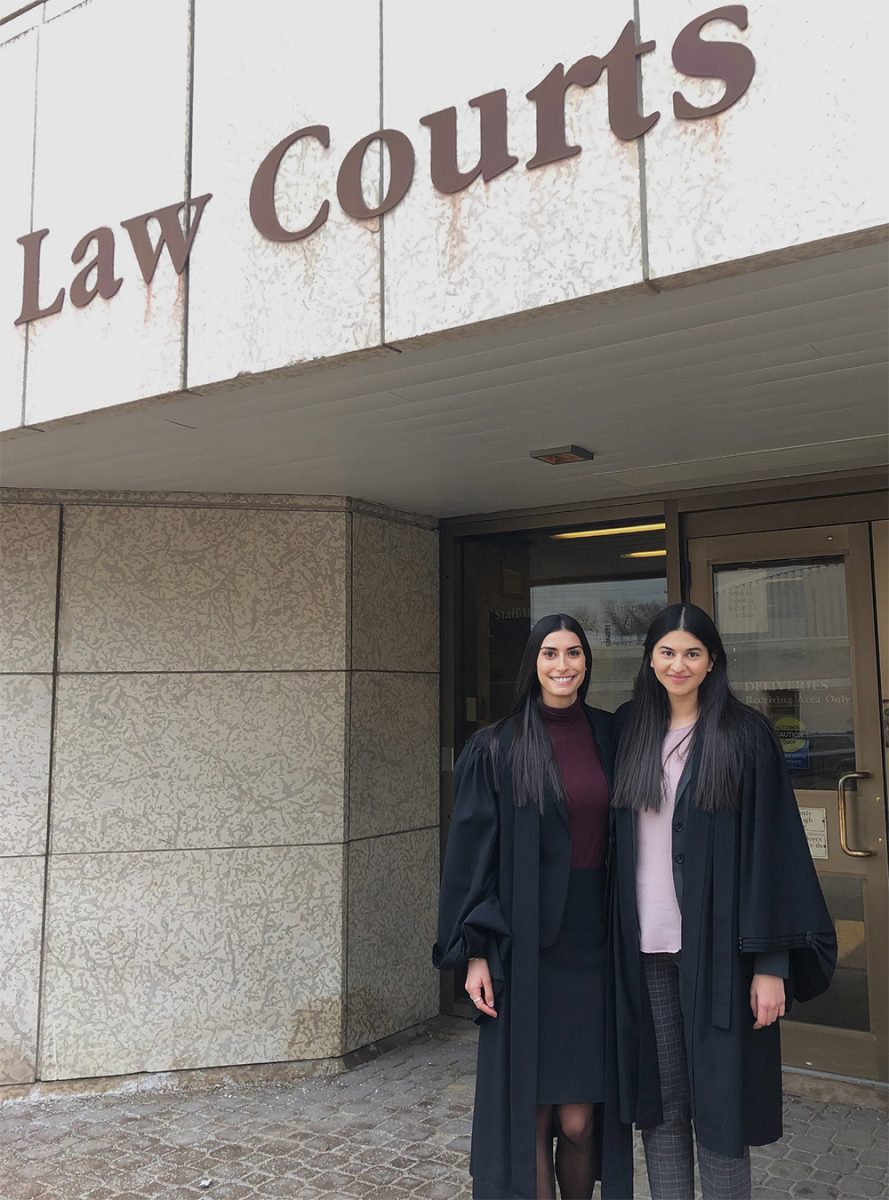Winnipeg actor and law student, Anjali Sandhu (right) at the law courts building for a moot court competition with classmate Lauren Yusim (left).