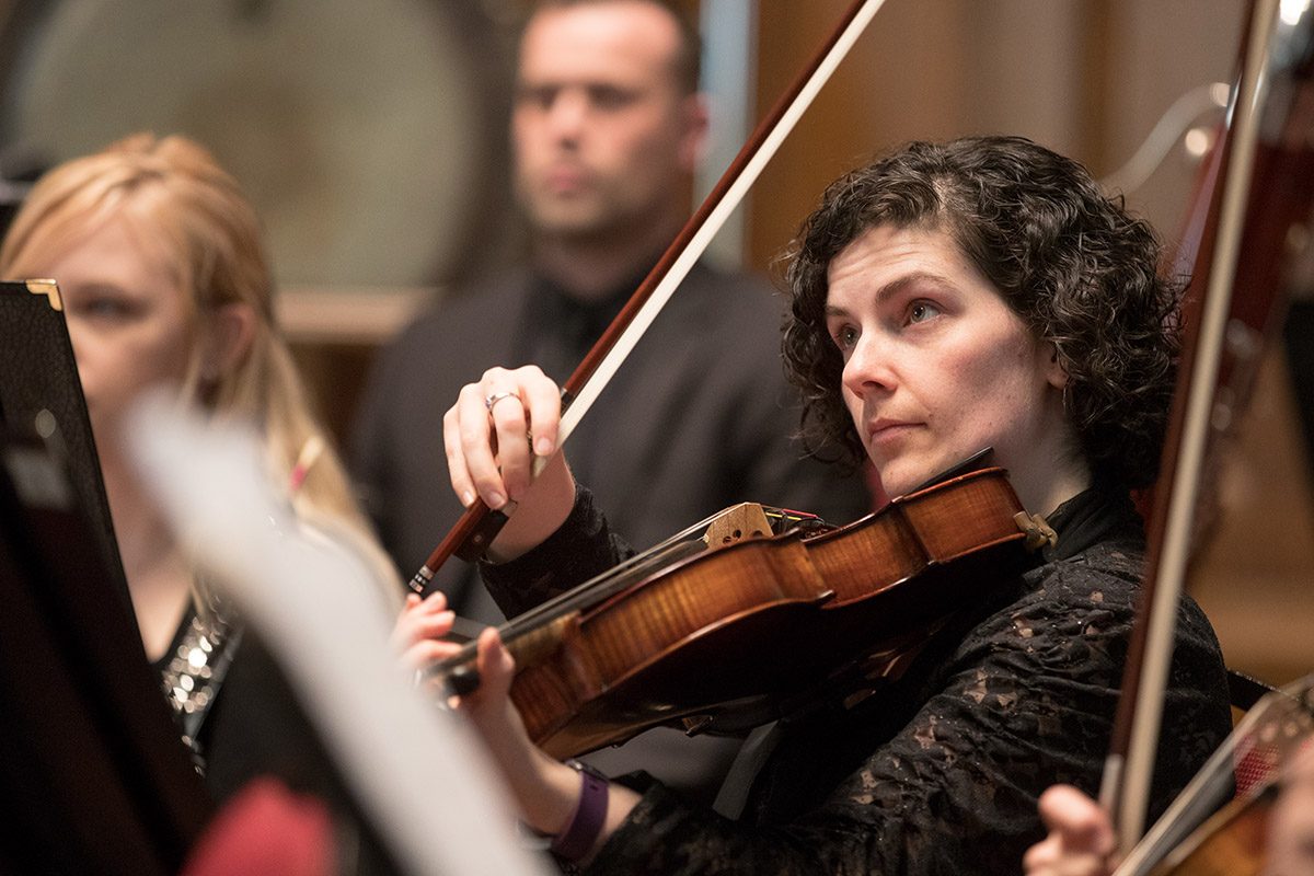 Violinist playing.