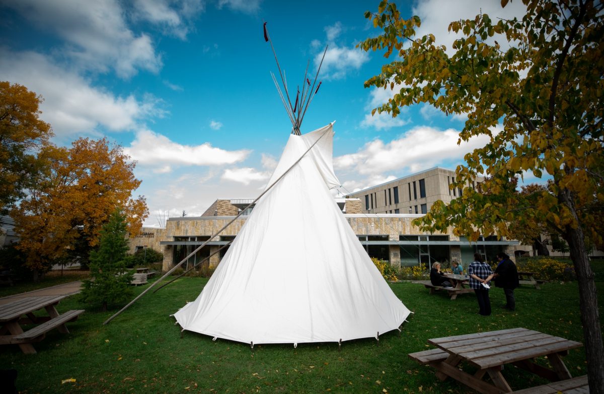 A tipi in front of Migizii Agamik building.