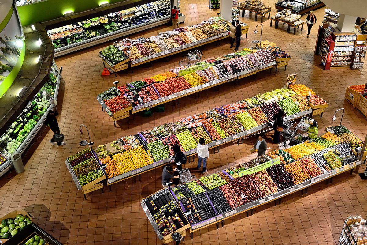 Looking down on fruits and vegetables at a grocery store. // Image from Pixabay