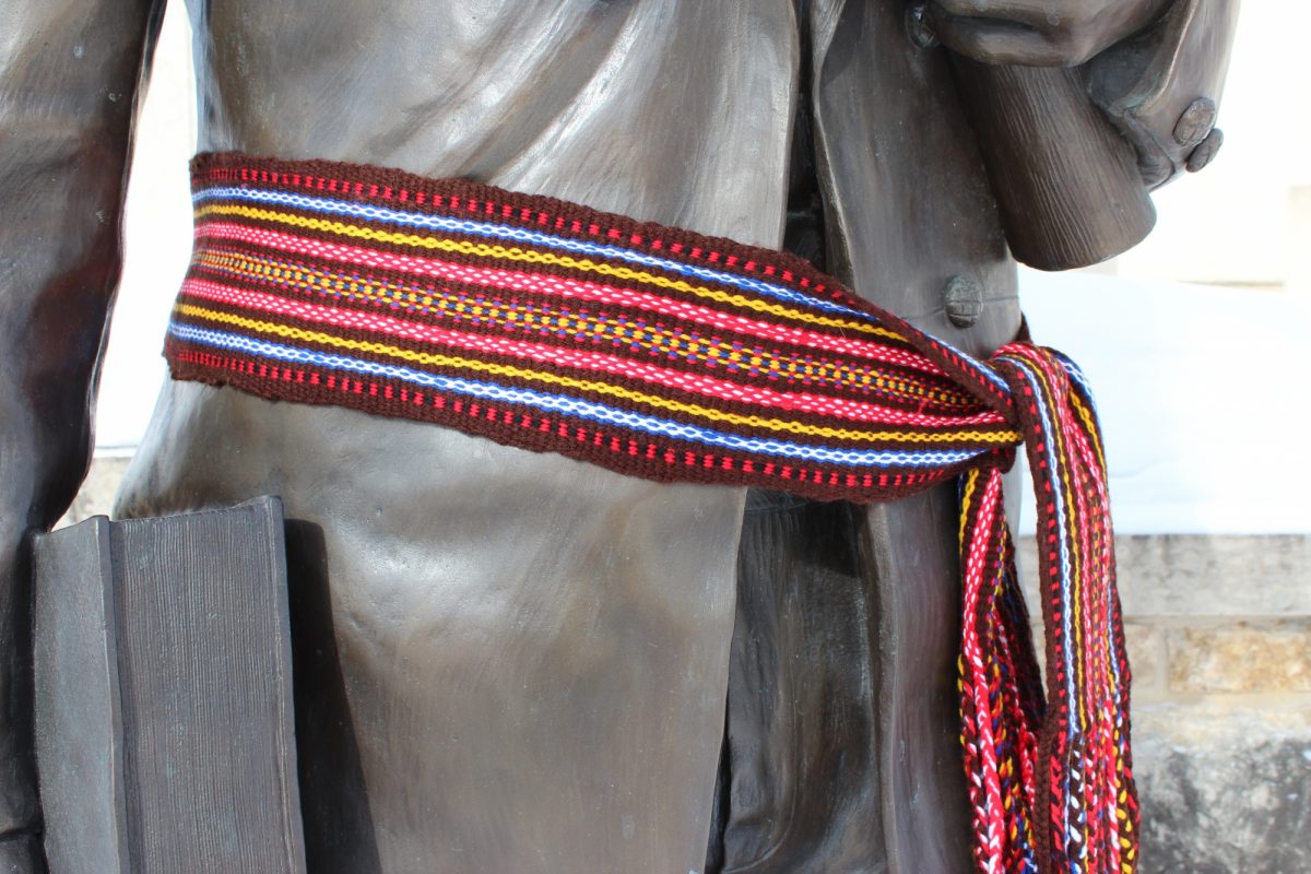 The Metis sash on the statue of Louis Riel at UM