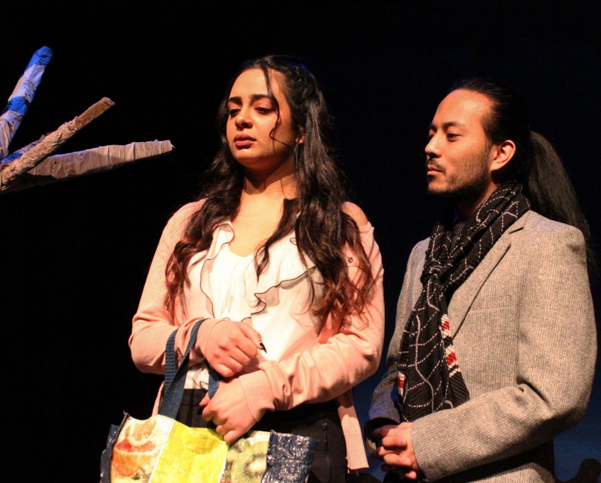 Image of two actors standing. From the play Capture Me.