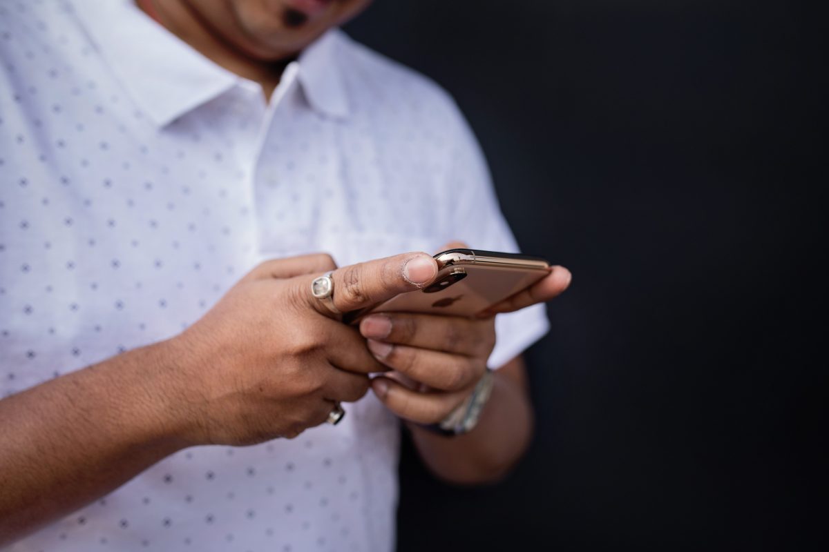 A person works on his phone