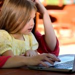 young child at computer