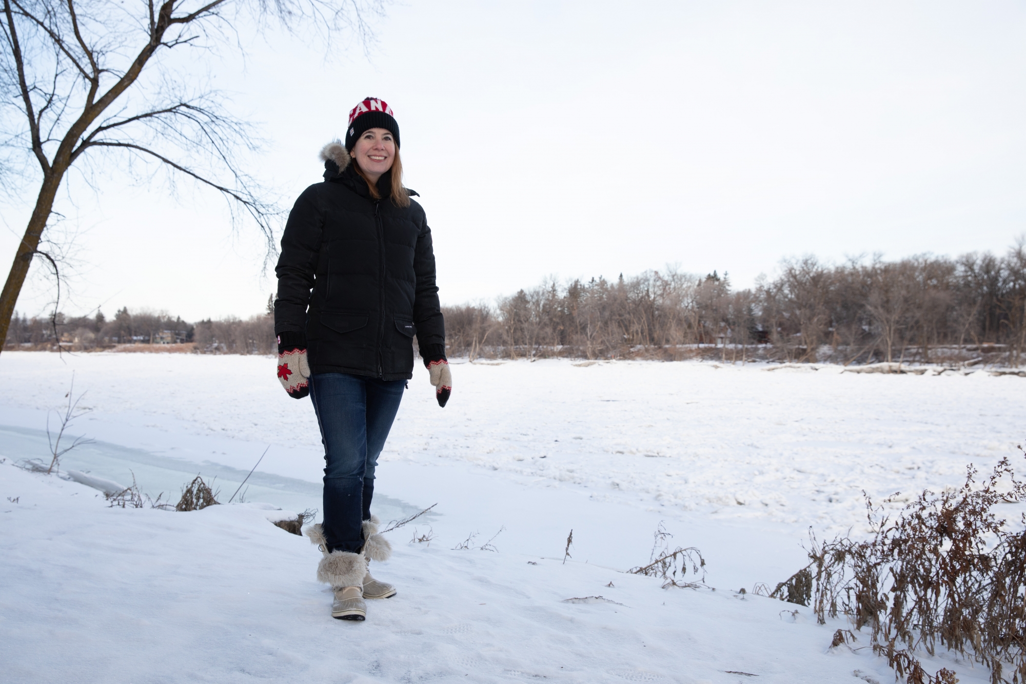 Civil engineering professor Karen Dow on the banks of the Red River in south Winnipeg | Mike Latschislaw