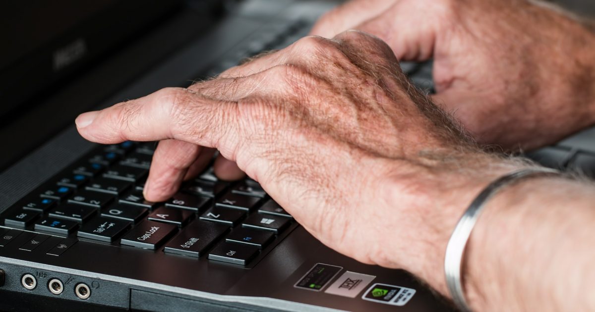 Hands on a computer keyboard