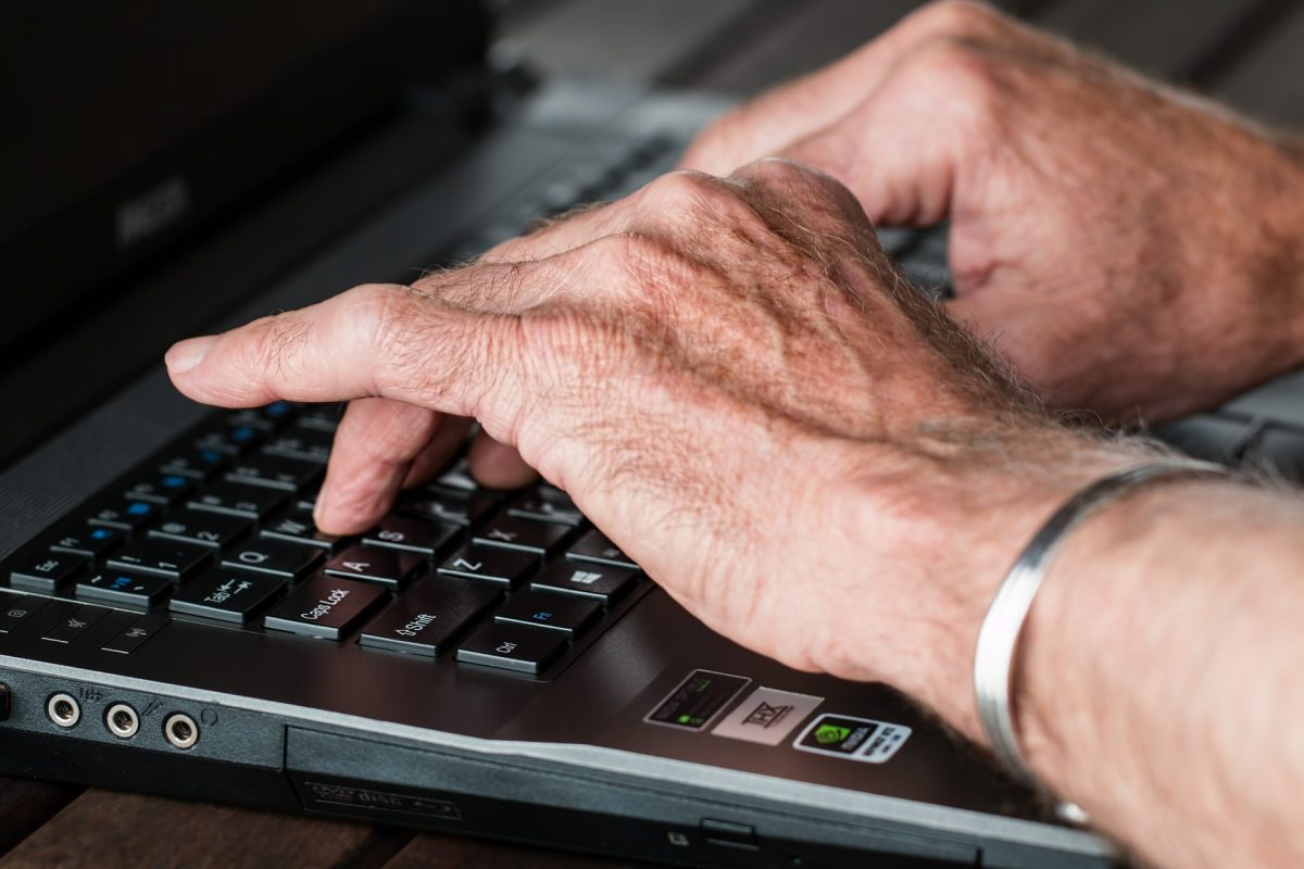 Hands on a computer keyboard