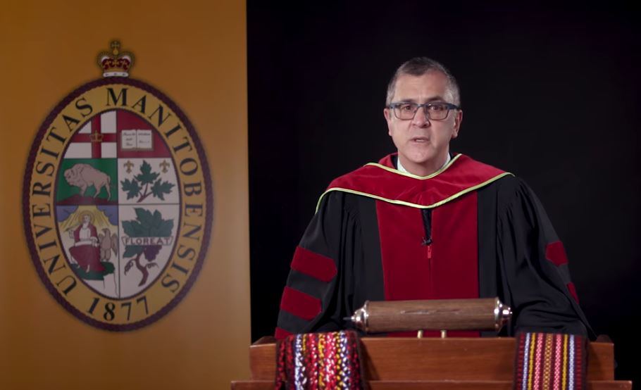 Acting Dean, David Mandzuk addresses Extended Education graduates.