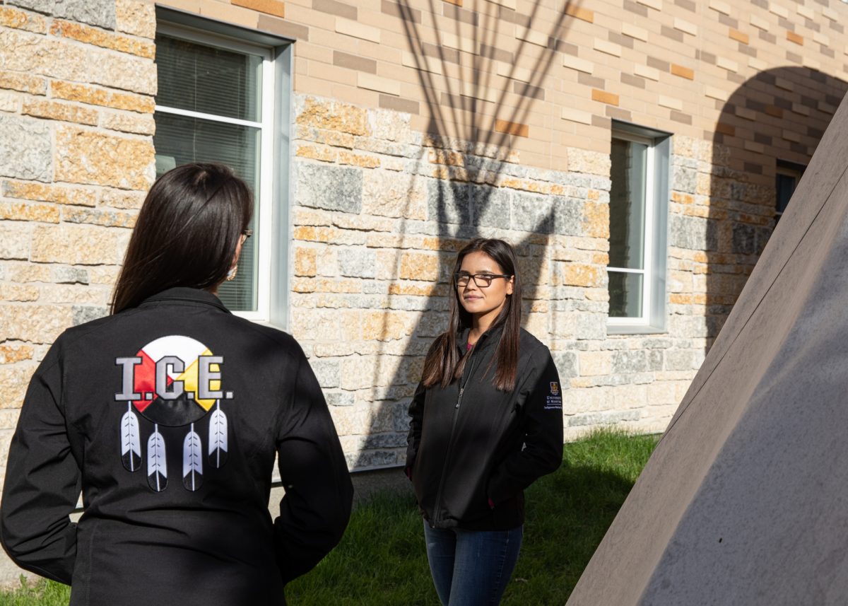 Indigenous Circle of Empowerment students outside of Migizii Agamik.