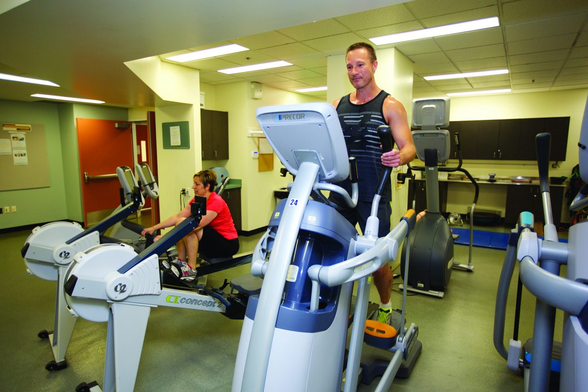 a couple people on the cardio machines at Joe Doupe Recreation Centre