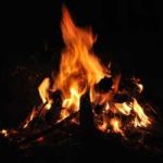 Image of a fire burning at night