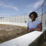 Leisha Strachan standing in an outdoor rink.