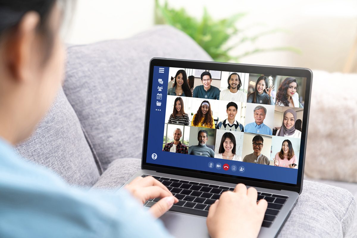 back-view-of-woman-on-video-call-with-others