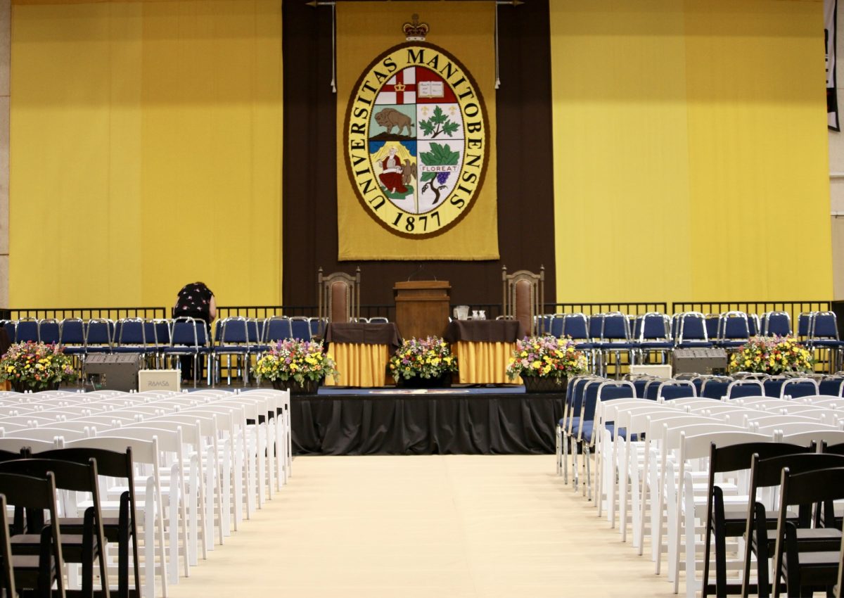 A photo of the Convocation stage in the Investors group athletic center, at the Fort Garry Campus.