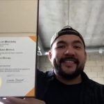 Dustin Murdock with his degree
