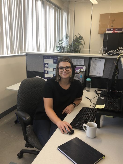 Karine Martel in an office