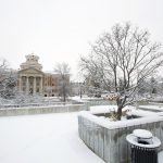 The Administration building with snow on the ground