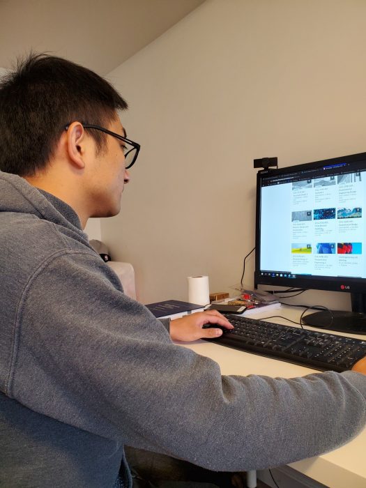 Yan Wang at computer 