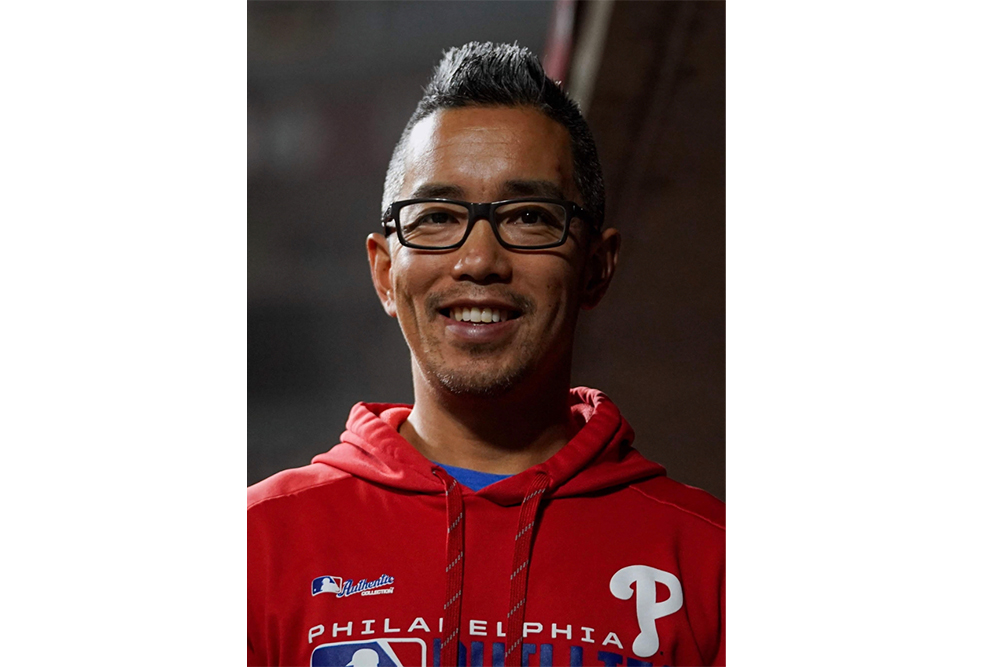 Dong Lien wearing a Philadelphia Phillies hoodie