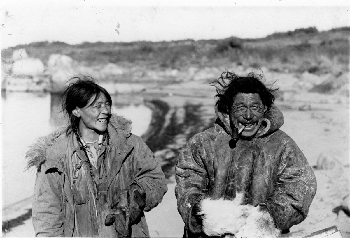 Black and white photo of Inuit couple, Pangullaq with wife Ulujak, Ennadai Lake, 1954.